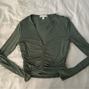 AND NOW THIS olive top